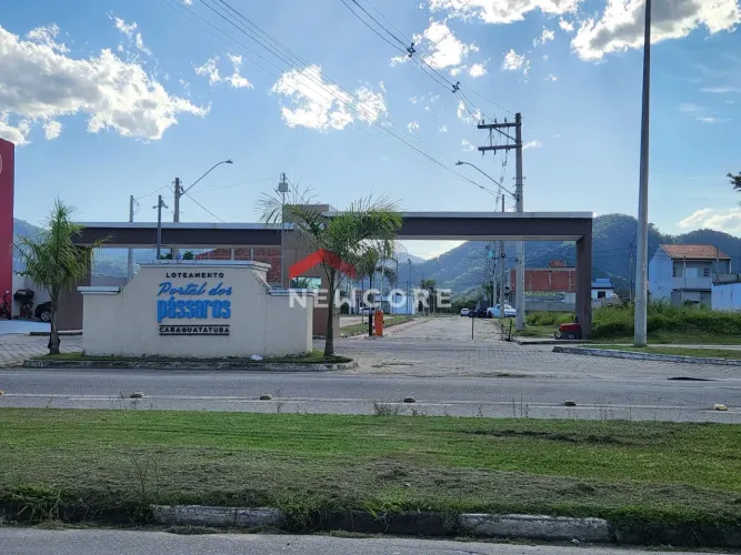 Casa de condomínio em Avenida José da Costa Pinheiro Júnior - Travessão - Caraguatatuba/SP