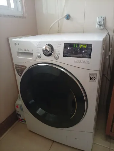 Máquina de lavar e seca usada lg