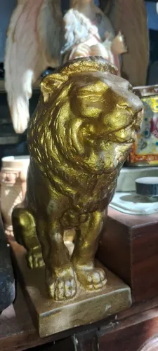 Leão antigo estatua