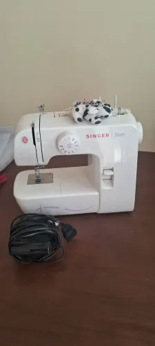 Máquina de costura singer