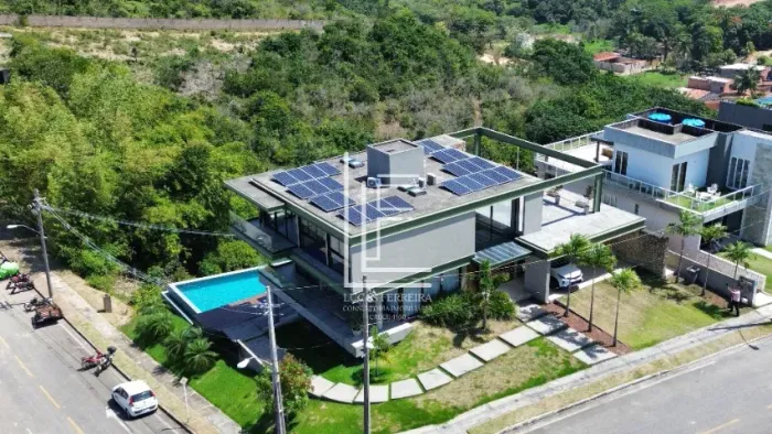 Belíssima casa sendo 4/4 todos suítes em condomínio fechado - Condomínio Atlantis