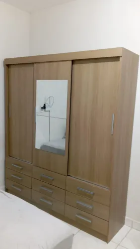 Guarda roupa casal 9 gavetas porta correr