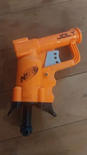 Nerf Jolt laranja usada. Ar comprimido 
