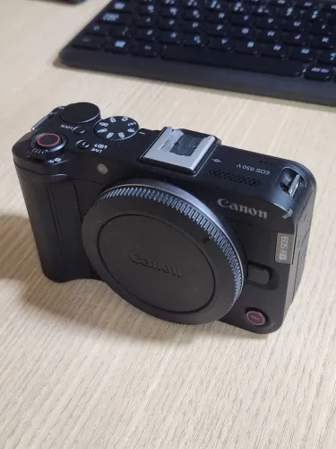 CANON R50v + adaptador + lente