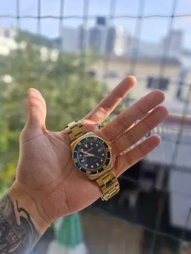 Relógio technos dourado e azul