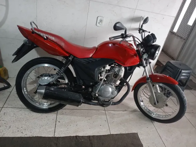 Vendo fan 125 top de linha...
