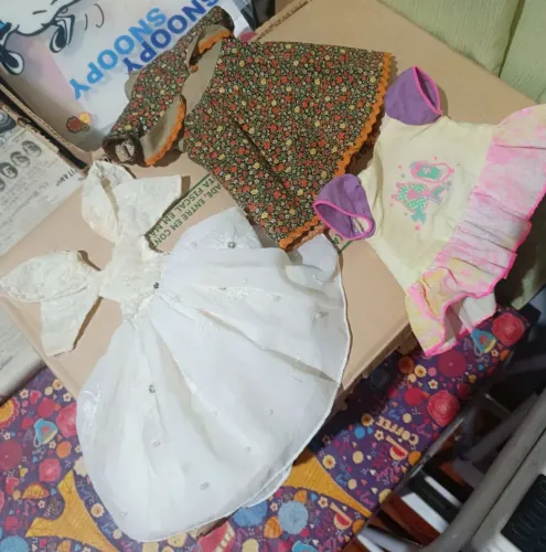 Roupinhas de boneca antigas
