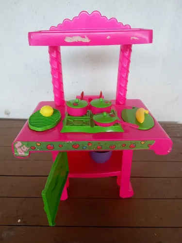 Brinquedo de fogão com as vasilhinha