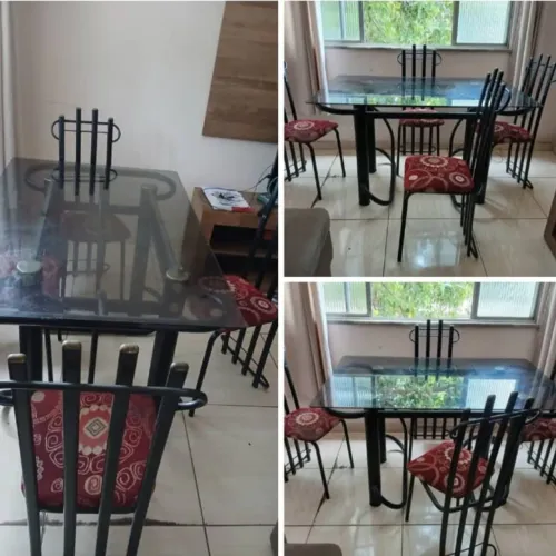 Mesa de jantar com tampo de vidro fume