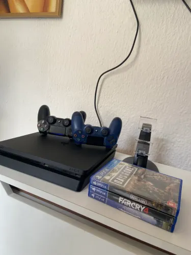 PS4 slim | 1 TB + 2 controles original + 3 jogos