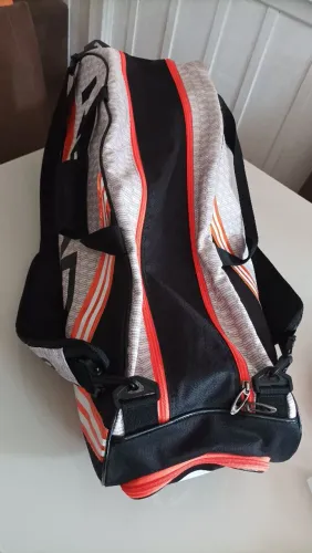 Raqueteira Head Djokovic Core 6r preta com laranja