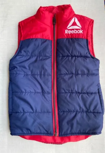 Jaqueta tipo Colete acolchoado infantil Reebok, pouquíssimo , uso,  tamanho 6