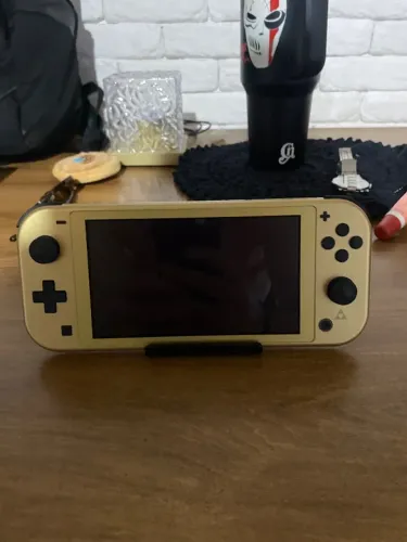 Nintendo Switch Lite Hyrule Edition + Jogos Zelda BotW é Zelda TotK