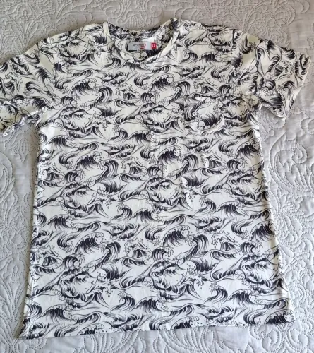 Camiseta Reserva Mini tamanho 12 com estampa de ondas