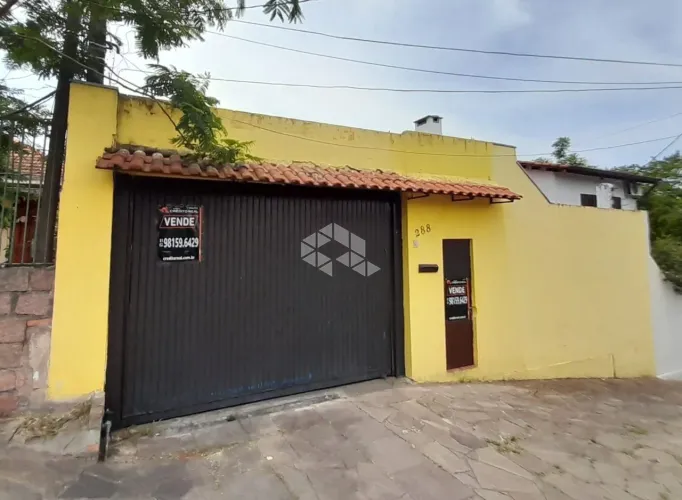 Casa 2 dormitórios terreno com 3 casas para venda no Bairro Santa Tereza em Porto Alegre