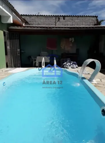 Casa com piscina à venda no bairro do Perequê Mirim em Caraguatatuba, SP