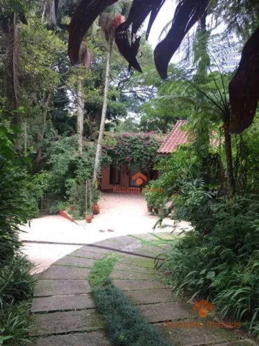 Chácara com 2 dormitórios à venda, 6607 m² por R$ 3.320.000,00 - Condomínio Iolanda - Tabo