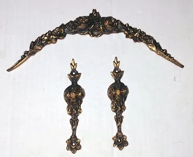 Puxadores e apliques de bronze