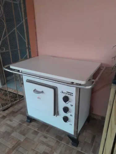 Fogão a gás com chapa de ferro