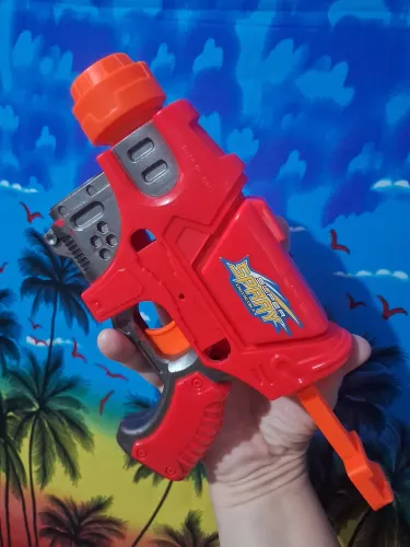 Pistola de Dardos<br>Contem algumas falhas na pintura<br>R$ 20