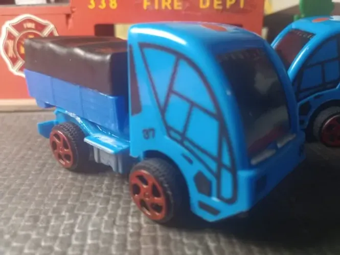 MINIATURA CAMINHÃO RESCUE 37 CARROCERIA LONADA - 9 cm.