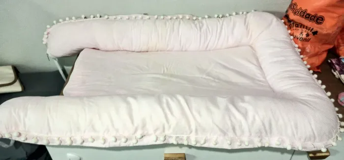 Ninho redutor de berço