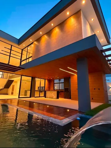 AB| Casa no Condomínio Damha | Piscina com deck molhado e cascata