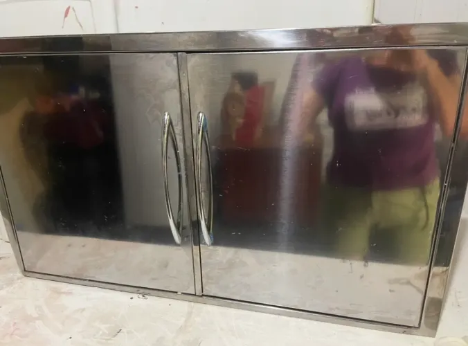 Porta de inox para churrasqueira  medindo de largura 78cm altur 45cm