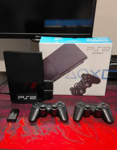 PS2 SLIM NA CAIXA!!! PS2 SLIM EXCELENTE COM DOIS CONTROLES DUALSHOCK 2 SEM FIO