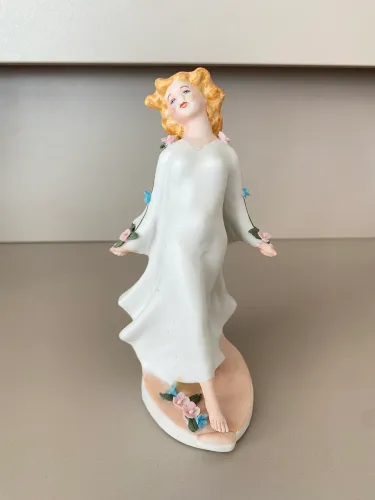 Escultura porcelana 14cm altura 