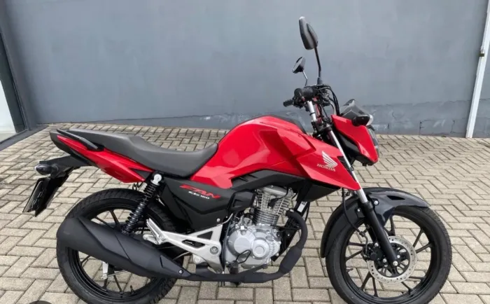 Troco Honda Fan 160 vermelha,O km ,em carro, moto está no valor de R$ 30.000 mil reais.