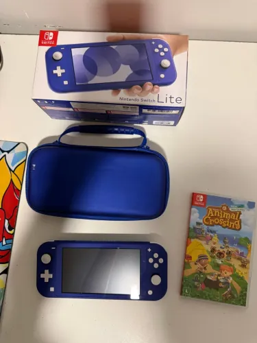 Nintendo Switch lite + jogos e acessórios