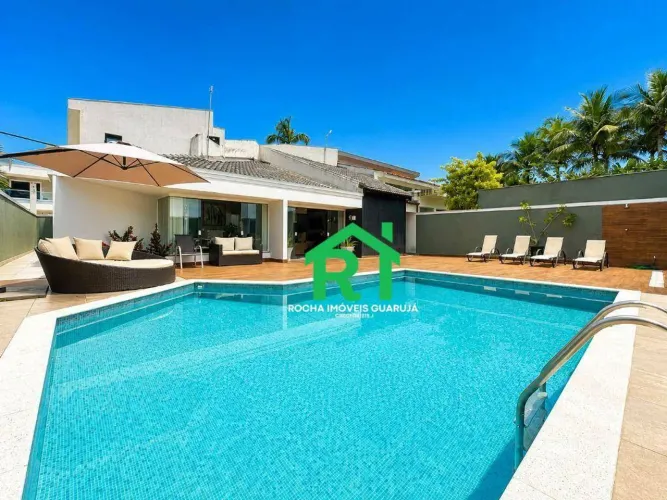 Casa com 4 quartos (3 suítes), 4 vagas e lazer à venda em Acapulco, Guarujá