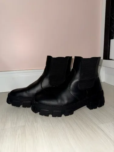 Coturno bota