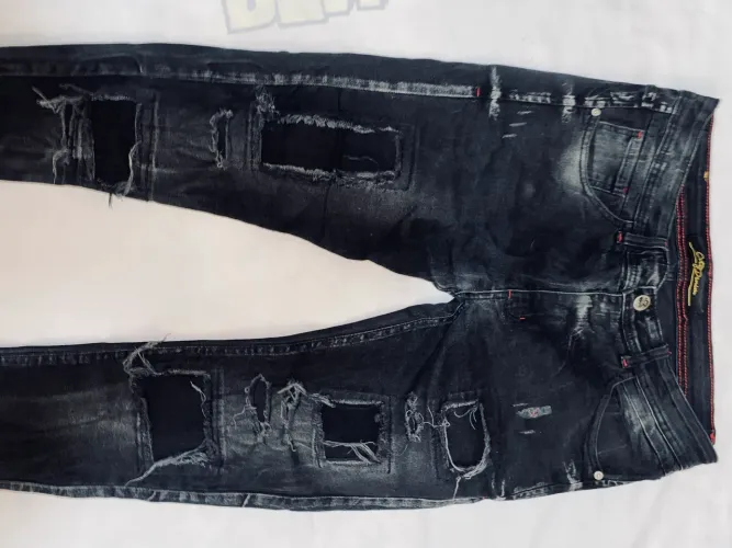 Calça jogador