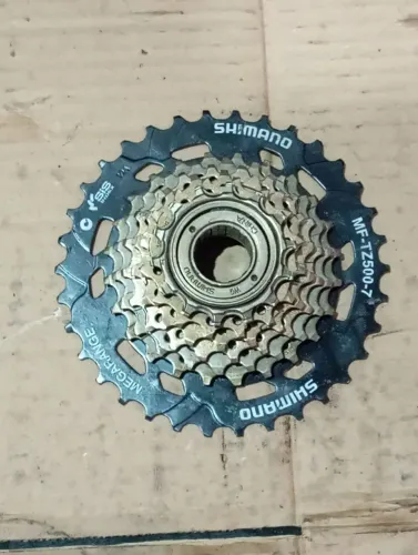 Catraca traseira Shimano tourney e corrente Shimano
