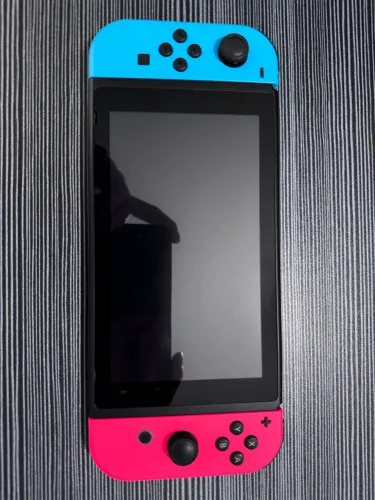 Nintendo Switch V2 + jogos + case