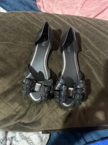 Sapatos com pouco uso