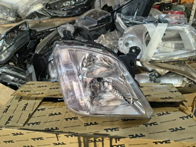 Farol direito MERIVA 03/12 NOVO 