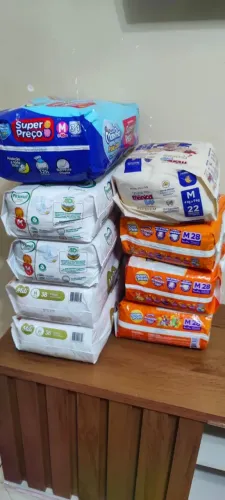 9 Pacotes de Fralda M por 200 reais