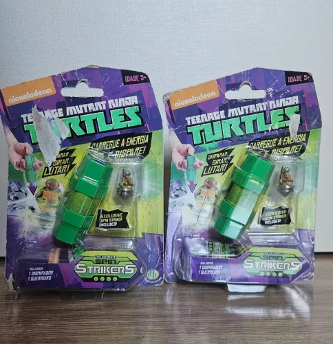 Lote Kit 2 Tartarugas Ninja Spin Strikers Disparador e Donatelo na Embalagem DTC BTF 2013