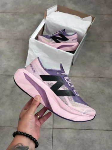 Tênis New Balance FuelCell Rebel V4 Feminino Importado Cor:Rosa/Roxo - Disponível 34 AO 39