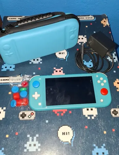 Nintendo switch lite, em ótimo estado com acessórios.