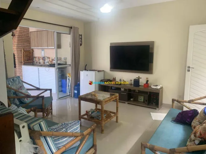 Village com 2 dormitórios à venda, 74 m² por R$ 630.000,00 - Rio da Praia - Bertioga/SP