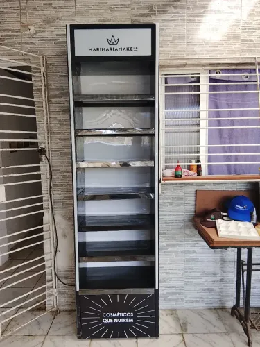Expositor com LED troco em máquina costura