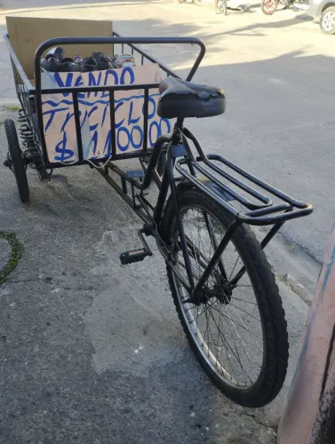 Triciclo gradeado, com raiação dupla e 6 molas