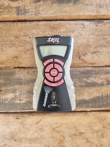 Trena a laser Skil 520 e Telefone Nks