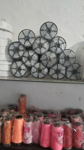 Linhas e fios de costura, elásticos.