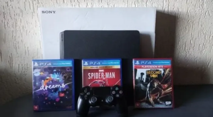 sony playstation 4 (usado) + console + 3 jogos inclusos (spider-man, second son, dreams)