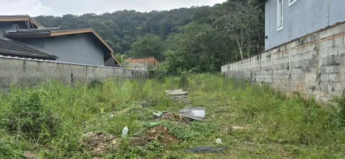 Terreno à venda, 300 m² por R$ 240.000 - Massaguaçu - Caraguatatuba/SP